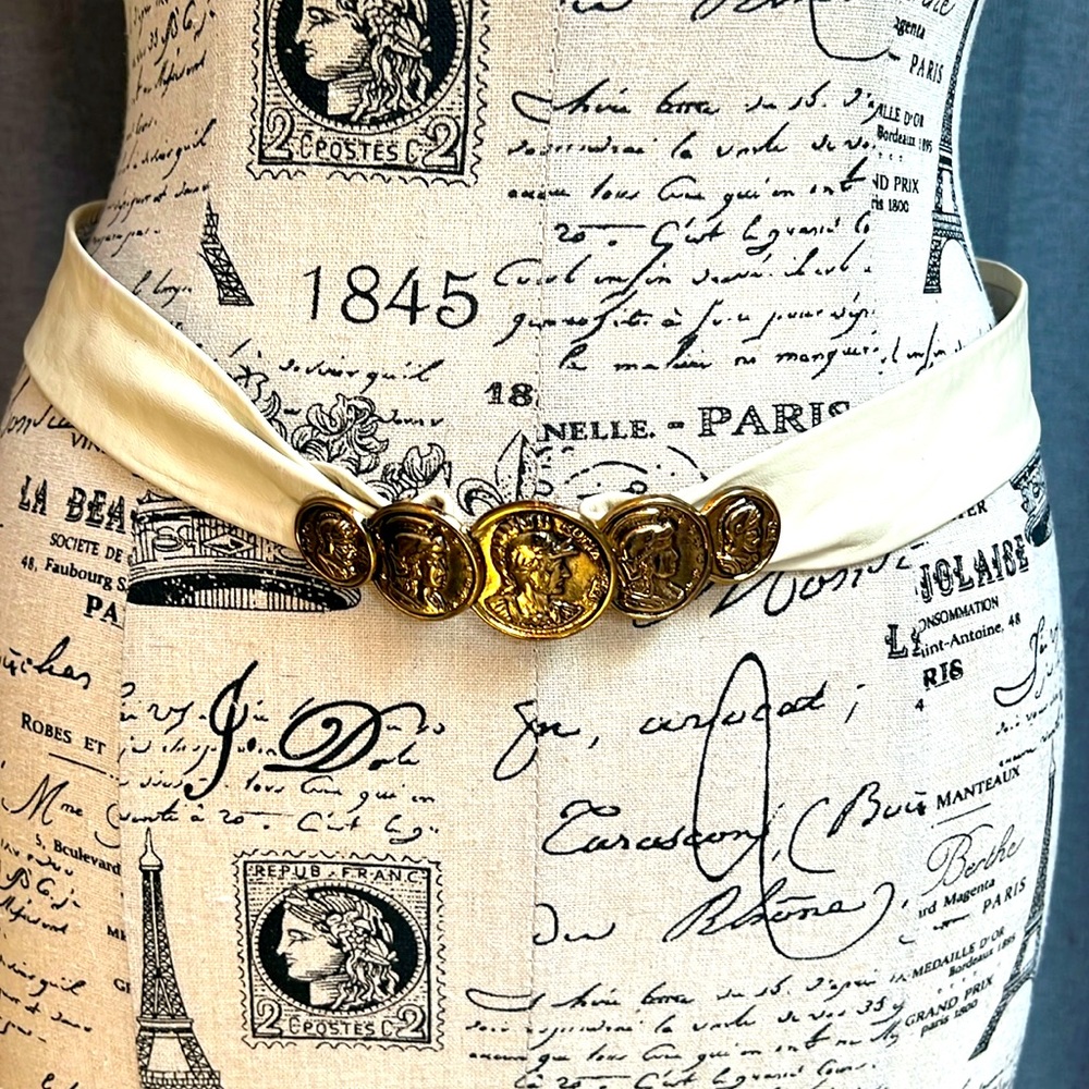 Never worn, adjustable, ivory leather belt